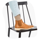 Honey Tan Leather Amberjack Chelsea Boots on a black chair