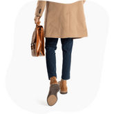 Honey Tan Leather Chelsea Boots on Model with Blue Pants - Walking Away