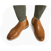 Honey Tan Leather Chelsea Boots on Model with Green Pants - Top Down View