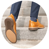 Amberjack tan leather dress shoes with blue socks