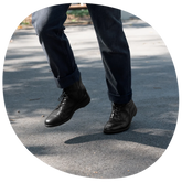 The Boot in Obsidian by Amberjack - on model running wearing black jeans