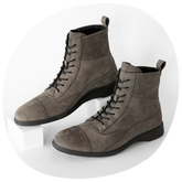 The Boot by Amberjack in Steel Gray Nubuck leather propped up on white block