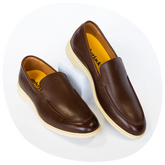 Loafer Chestnut & Cream close image of leather elevated by prop